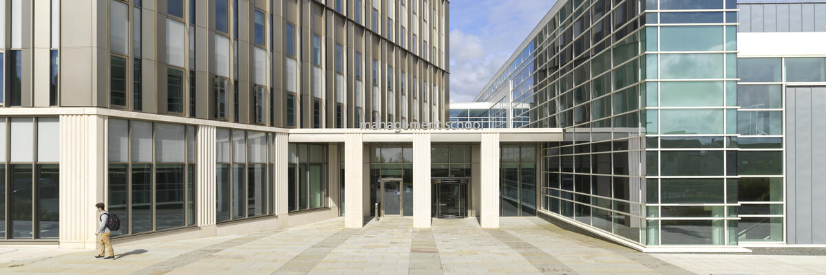 The exterior of Lancaster University Management School on a sunny day